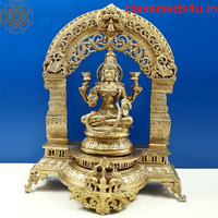 Ardha-Padmasana Devi Lakshmi Bronze Statue Within A Makeshift Temple